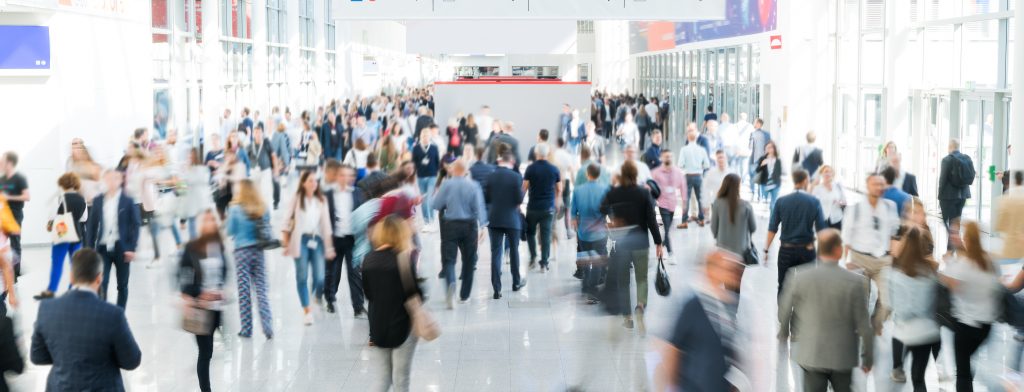 travelers in a busy airport